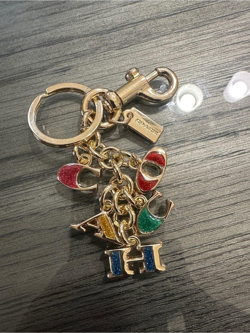 Coach Gold-Tone Keychain with Multicolor Enamel Letter Charms